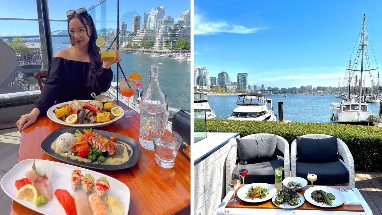 A woman holding up a drink with plates of food in front of her with a view of water and buildings behind her. Right: A table filled with food and chairs around it in front of the ocean with boats and buildings.